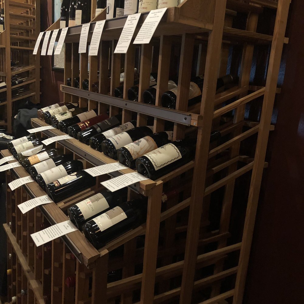 Libation - a wine rack full of wine bottles - Beer, Wine & Spirits Near Me - Arcata, California Libation - a wine rack full of wine bottles - Beer, Wine & Spirits Near Me - Arcata, California