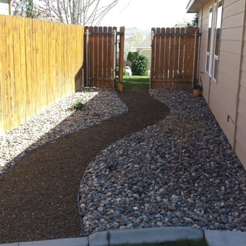 Musser Landscaping - a gravel path between two houses - Landscaping Near Me - Richland, Washington Musser Landscaping - a gravel path between two houses - Landscaping Near Me - Richland, Washington