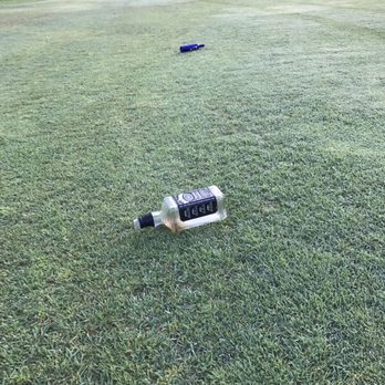 Cresta Verde Golf Course - Bottle service on the first fairway at 630 am. If they didn't open up an hour late , they could of probably cleaned this up. - Golf Near Me - Corona, California
