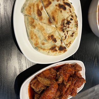 Myungin Dumplings - pancake with green onion and 17. Sweet & Spicy Fried Chicken - Half - Korean Near Me - Northridge, California Myungin Dumplings - pancake with green onion and 17. Sweet & Spicy Fried Chicken - Half - Korean Near Me - Northridge, California