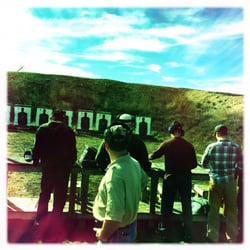 Asgard National Training Group - Steve supervises students preparing to take their CHL shooting test.