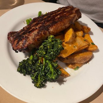 Tarpy's Roadhouse - New York steak with broccoli and instead of the side it came with they accommodated with homage wedge fries. - New American Near Me - Monterey, California Tarpy's Roadhouse - New York steak with broccoli and instead of the side it came with they accommodated with homage wedge fries. - New American Near Me - Monterey, California