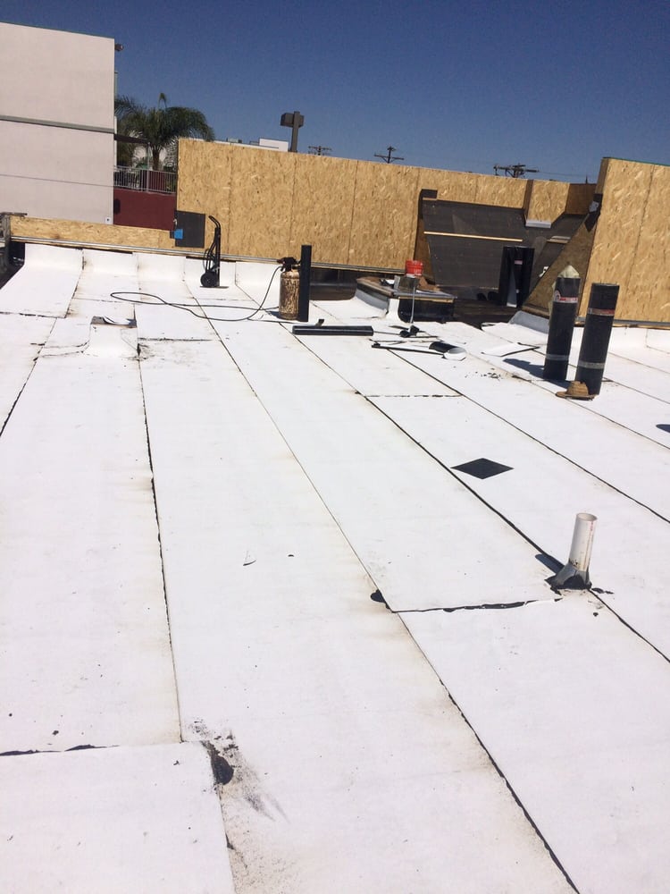 Slide of Vulcan Roofing Co