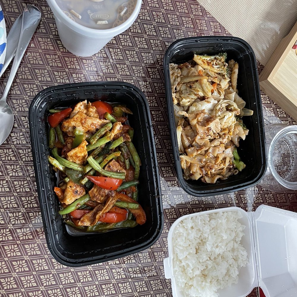two containers of food on a table