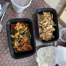 two containers of food on a table