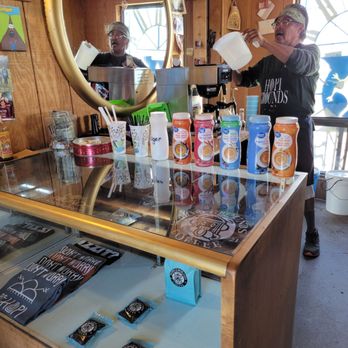 Hopi Grounds - a man standing in front of a counter - Breakfast & Brunch Near Me - Second Mesa, Arizona