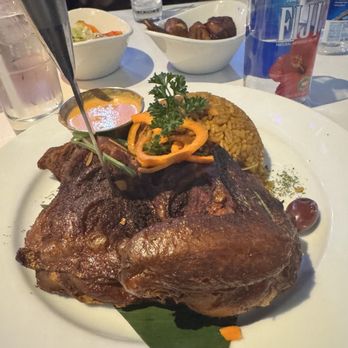 The Icon Restaurant and Lounge - Peri Peri chicken with Jollof rice - Lounges Near Me - Richardson, Texas