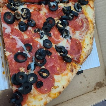 PizMo Cafe - Pepperoni, olives & garlic with extra sauce but it's dryer than the dunes! - Pizza Near Me - Pismo Beach, California