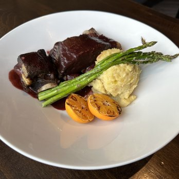 The Raven Bistro - Old fashioned bison short ribs. Mashed potatoes deserve a separate picture :) - Mediterranean Near Me - Jasper, Alberta The Raven Bistro - Old fashioned bison short ribs. Mashed potatoes deserve a separate picture :) - Mediterranean Near Me - Jasper, Alberta