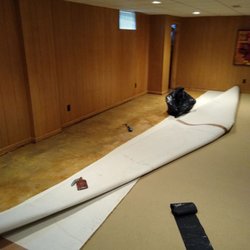 Action Flooring & Carpet Cleaning - We remove wet padding, spray with antimicrobial and dry it.