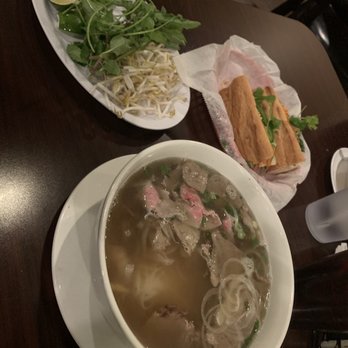 Pho Bar - The Bánh Mì Gà Nung was filled with grilled chicken and the Ph Đc Bit came with a plate of fresh garnishes. - Vietnamese Near Me - Rio Rancho, New Mexico
