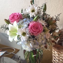 This arrangement was perfect! Thank you so much for the personal care and delivery. We absolutely love the flowers!