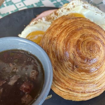 La Panadería - Breakfast crossaint with beans soup. - Cafes Near Me - San Antonio, Texas