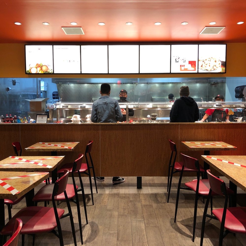 two people sitting at the counter