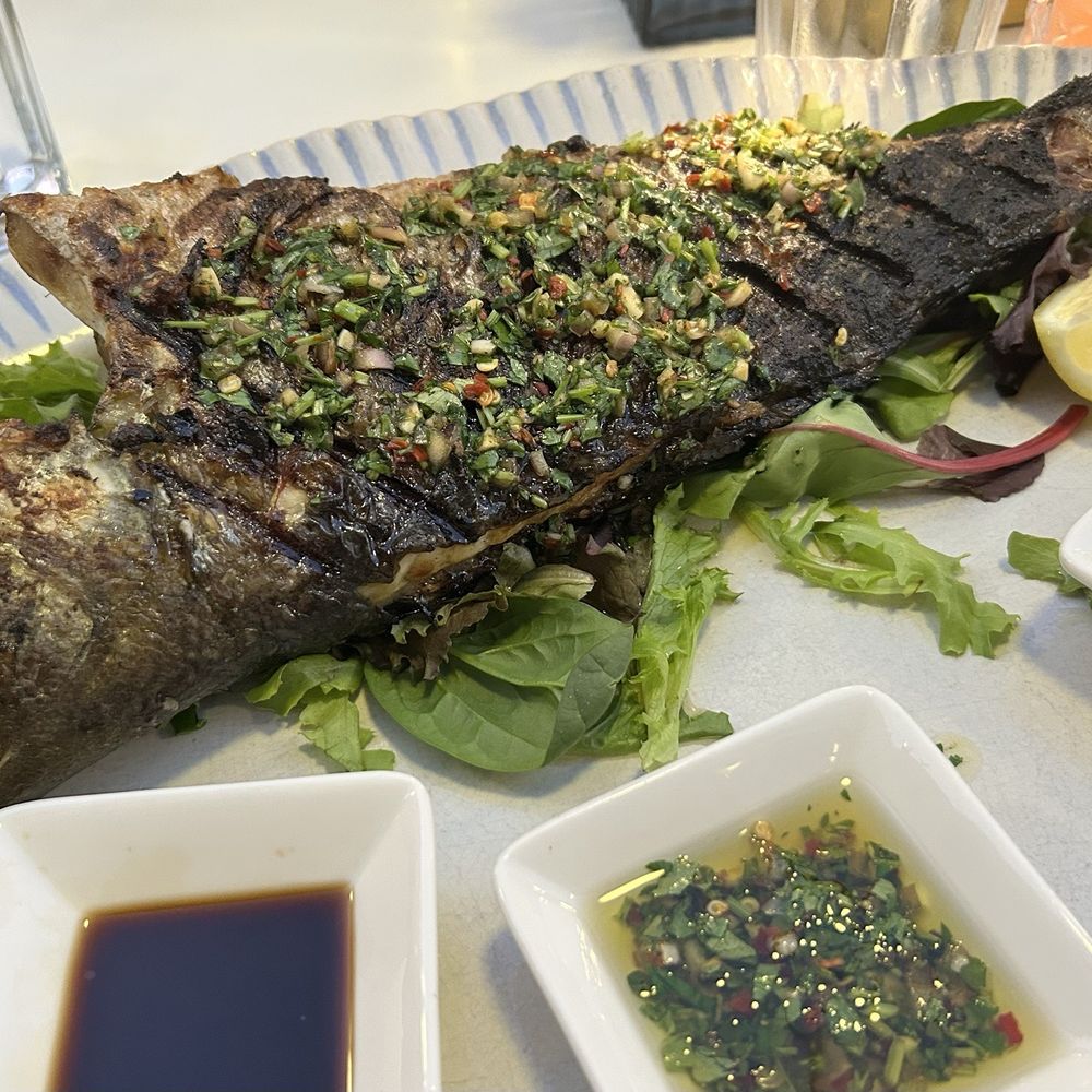 While grilled fish While grilled fish