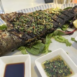 While grilled fish While grilled fish