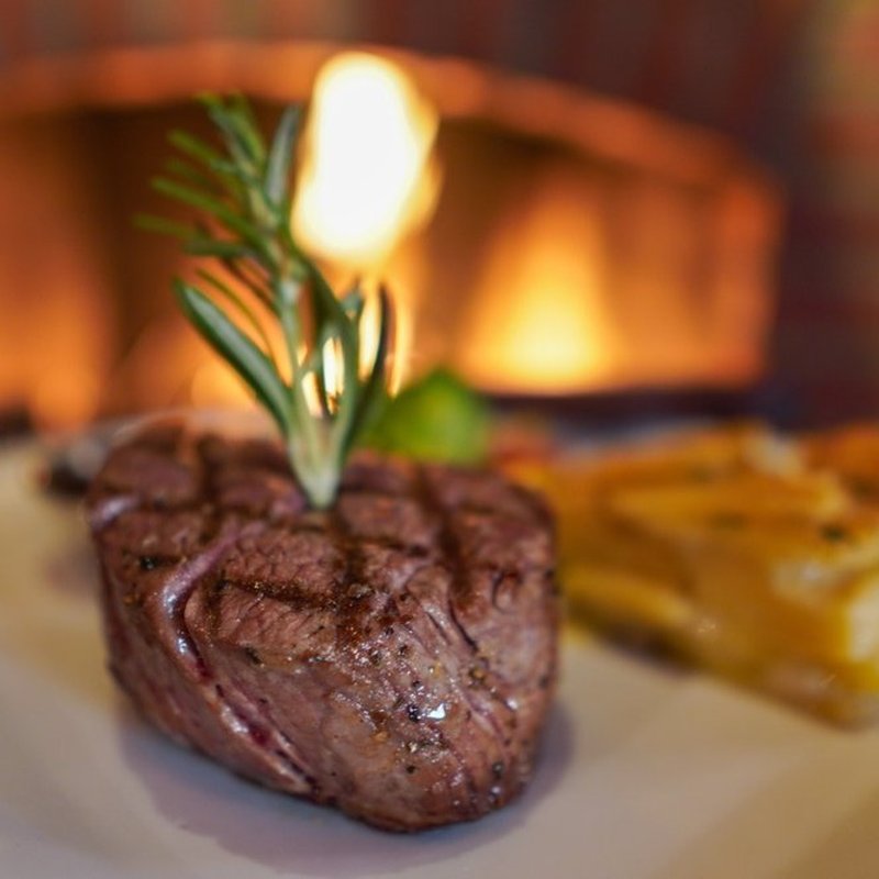 outdoor patio with five fireplaces