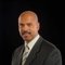 Dennis M.