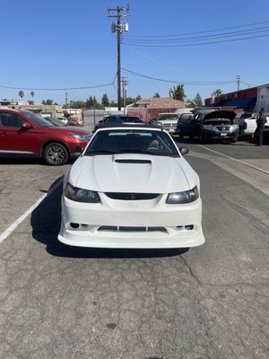 2003 Ford Mustang GT Roush Color Complete - This customer came in with a vandalism claim after his vehicle was keyed. We worked with him to not only restore his car to it's prime but give him the color he wanted , Torch Red.