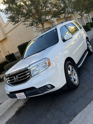 Full interior/exterior detail of a White Honda. - Beautiful detail of this Honda suv interior/exterior restored and a ceramic paint protection added on the front.