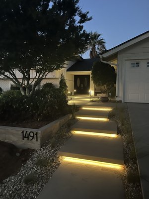 New Concrete Driveway, concrete wall , walkway and floating steps with integrated LED strip lights. - We Demolished the old brick Driveway and garden wall. We gave this home a modern touch using diamond cuts on the new concrete driveway and wood Grain exposed concrete wall along with floating steps. New Concrete Driveway, concrete wall , walkway and floating steps with integrated LED strip lights. - We Demolished the old brick Driveway and garden wall. We gave this home a modern touch using diamond cuts on the new concrete driveway and wood Grain exposed concrete wall along with floating steps.