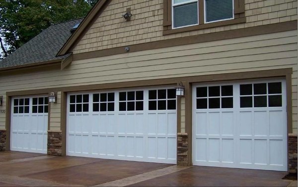 4-Door Garage - Over the past 50 years, Ed's Garage Doors has sold, installed and serviced thousands of doors and door openers in Connecticut, Westchester County and beyond. As a family-owned and operated company, we take our business personally, and listen closely to our customers and provide them with custom solutions for their homes. The attention and respect we show our clients has helped us to grow into one of the most respected business in Connecticut. Our team understands the importance of garage doors beyond their functionality - they are an important design element of your home, and should reflect your personal style while providing lasting protection and security for your home's most-used entrance. 4-Door Garage - Over the past 50 years, Ed's Garage Doors has sold, installed and serviced thousands of doors and door openers in Connecticut, Westchester County and beyond. As a family-owned and operated company, we take our business personally, and listen closely to our customers and provide them with custom solutions for their homes. The attention and respect we show our clients has helped us to grow into one of the most respected business in Connecticut. Our team understands the importance of garage doors beyond their functionality - they are an important design element of your home, and should reflect your personal style while providing lasting protection and security for your home's most-used entrance.