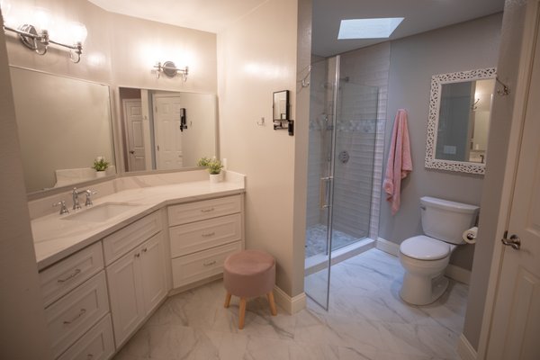 Casa De Lago - Our Casa De Lago project involved a comprehensive renovation of a primary bathroom, transforming it into a modern and luxurious space. The renovation included the installation of a new vanity and sinks, providing a sleek and functional upgrade. We replaced the old bathtub with a spacious walk-in shower, featuring contemporary fixtures and elegant tiling. Additionally, new flooring was installed, enhancing the overall aesthetic and ensuring durability. Other upgrades included improved lighting, fresh paint, and updated storage solutions, resulting in a beautifully refreshed and highly functional primary bathroom. Casa De Lago - Our Casa De Lago project involved a comprehensive renovation of a primary bathroom, transforming it into a modern and luxurious space. The renovation included the installation of a new vanity and sinks, providing a sleek and functional upgrade. We replaced the old bathtub with a spacious walk-in shower, featuring contemporary fixtures and elegant tiling. Additionally, new flooring was installed, enhancing the overall aesthetic and ensuring durability. Other upgrades included improved lighting, fresh paint, and updated storage solutions, resulting in a beautifully refreshed and highly functional primary bathroom.