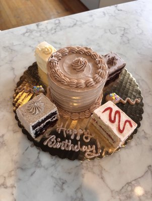 Signature Cakes, Minis & Half Cakes - Browse our delicious collection of full-size cakes, charming mini cakes, and trendy half cakes! Each creation is crafted with care, perfect for celebrations big and small. See how our custom designs and flavors bring every sweet moment to life.