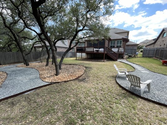 Backyard renovation - My first landscaping job! Customer had no grass growing in areas in the backyard we came in and applied 15 yards of rock and a walkways to a fireplace! Backyard renovation - My first landscaping job! Customer had no grass growing in areas in the backyard we came in and applied 15 yards of rock and a walkways to a fireplace!