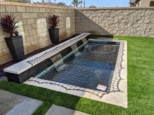 All-Safe Pool Safety Net - Swimming pool safety nets are one of the safest, most effective ways to secure your pool without sacrificing the beauty of your backyard. Unlike bulky covers or restrictive barriers, a custom-fitted safety net gives parents and homeowners peace of mind while maintaining an open, unobstructed view of the water.
Our pool nets are professionally measured and custom-installed to ensure a tight, secure fit that prevents accidental access to the pool. The small mesh openings make it physically impossible for a child to fall through, while the tensioned design keeps the net firm and supportive. Each net includes a central tensioning system (CTSS) that makes removal and re-installation simple and quick — most homeowners can tighten or release the net in just a few minutes.
Pool safety nets are an ideal solution for families with young children, pets, visiting grandchildren, or anyone looking to add another layer of protection around water. They're also popular for uniquely shaped pools, raised walls, infinity edges, and water features where a traditional fence may not work.
Most importantly, our pool nets comply with ASTM safety standards and are built to stand up to real-world use — including curious toddlers and energetic dogs. They’re strong, low-maintenance, visually appealing, and a smart investment in layered pool safety.
Whether you're looking to protect your family, safeguard visiting guests, or meet local safety requirements, a pool safety net is an excellent choice for secure, attractive, and reliable protection.
Contact us today to schedule your free estimate or ask any questions about whether a safety net is right for your pool.