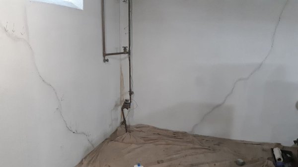 crack injection - Injected cracks with polyurethane foam, after covering crack with epoxy so foam couldn't escape, filling crack completely to outside/top to bottom. LIFETIME Warranty