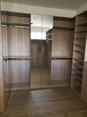 Custom Wood closets with mirror doors - These closets were completed for an entire remodeled house. Custom Wood closets with mirror doors - These closets were completed for an entire remodeled house.