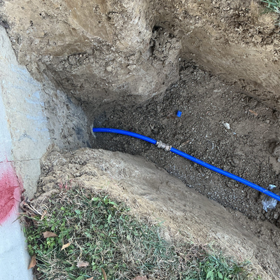 Water Line Repair November 2025 - Another successful underground plumbing project has been completed by True Flow Services! This time, our team was called out to Martinique Drive in Mount Orab, Ohio, where a homeowner was experiencing unreliable water pressure and growing concerns about an aging water service line. The solution? A comprehensive underground water line replacement that included excavation from the home to the city meter tail, using high-quality, code-compliant materials. Where possible, we utilized a trenchless pull method to minimize yard disruption. We also installed a new pressure reducing valve (PRV) for consistent water pressure and replaced the main shutoff valve to ensure easy, reliable water control. Once the installation was complete, we carefully backfilled the trench with a slight mound to allow for natural settling. While True Flow Services does not handle final grading or reseeding, we always leave the site safe and secure. This full water service line replacement comes with a 10-year parts and labor warranty, along with a 5-year warranty on the PRV and shutoff valve. Older water lines, especially in rural areas like Mount Orab, are often vulnerable to leaks, shifting soil, and deteriorating materials—which is why this replacement was essential to ensure long-term reliability and peace of mind for the homeowner. Water Line Repair November 2025 - Another successful underground plumbing project has been completed by True Flow Services! This time, our team was called out to Martinique Drive in Mount Orab, Ohio, where a homeowner was experiencing unreliable water pressure and growing concerns about an aging water service line. The solution? A comprehensive underground water line replacement that included excavation from the home to the city meter tail, using high-quality, code-compliant materials. Where possible, we utilized a trenchless pull method to minimize yard disruption. We also installed a new pressure reducing valve (PRV) for consistent water pressure and replaced the main shutoff valve to ensure easy, reliable water control. Once the installation was complete, we carefully backfilled the trench with a slight mound to allow for natural settling. While True Flow Services does not handle final grading or reseeding, we always leave the site safe and secure. This full water service line replacement comes with a 10-year parts and labor warranty, along with a 5-year warranty on the PRV and shutoff valve. Older water lines, especially in rural areas like Mount Orab, are often vulnerable to leaks, shifting soil, and deteriorating materials—which is why this replacement was essential to ensure long-term reliability and peace of mind for the homeowner.