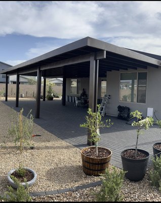 Alumawood SolidTop Patio Cover Installed in Henderson NV - This patio cover was added to the back of the homeowners house to help with the sun exposure and create a backyard family area. Alumawood SolidTop Patio Cover Installed in Henderson NV - This patio cover was added to the back of the homeowners house to help with the sun exposure and create a backyard family area.