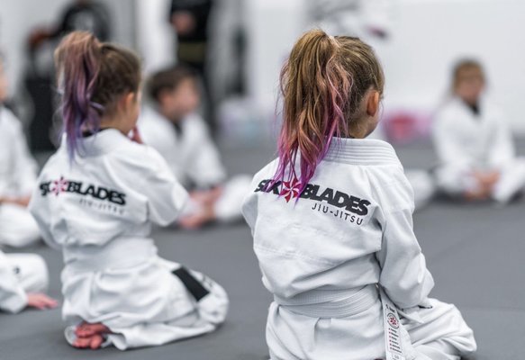 Women’s Jiu-Jitsu & Self-Defense Program - Our Women’s Jiu-Jitsu Program is designed to help women build confidence, awareness, self-defense skills, and physical strength in a safe, respectful, and family-oriented environment.
At Six Blades Jiu-Jitsu South Denver, we believe every woman deserves to feel more confident in her ability to protect herself and navigate difficult situations with awareness and control. Brazilian Jiu-Jitsu is one of the most effective martial arts for self-defense because it teaches leverage, positioning, escapes, distance management, and how to stay calm under pressure.
Our academy provides a welcoming space where women of all ages and experience levels can train safely, learn at their own pace, and feel supported from day one. Whether your goal is self-defense, fitness, confidence, stress relief, or personal growth, our team is here to guide you with patience, professionalism, and care.
We are proud to offer a positive training environment where students feel respected, encouraged, and part of a strong community. Women’s Jiu-Jitsu & Self-Defense Program - Our Women’s Jiu-Jitsu Program is designed to help women build confidence, awareness, self-defense skills, and physical strength in a safe, respectful, and family-oriented environment.
At Six Blades Jiu-Jitsu South Denver, we believe every woman deserves to feel more confident in her ability to protect herself and navigate difficult situations with awareness and control. Brazilian Jiu-Jitsu is one of the most effective martial arts for self-defense because it teaches leverage, positioning, escapes, distance management, and how to stay calm under pressure.
Our academy provides a welcoming space where women of all ages and experience levels can train safely, learn at their own pace, and feel supported from day one. Whether your goal is self-defense, fitness, confidence, stress relief, or personal growth, our team is here to guide you with patience, professionalism, and care.
We are proud to offer a positive training environment where students feel respected, encouraged, and part of a strong community.