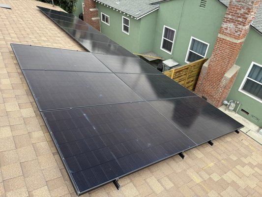 Solar Panel Installation, Burbank, CA - Not every roof is a perfect rectangle, and our team knows how to adapt. For this 11-panel-project, we designed a custom stepped layout that maximizes the usable roof space while respecting the home's structural ridge line. By staggering the array, we were able to add additional panels that a standard square layout would have missed, ensuring the homeowner gets the maximum possible energy offset. Solar Panel Installation, Burbank, CA - Not every roof is a perfect rectangle, and our team knows how to adapt. For this 11-panel-project, we designed a custom stepped layout that maximizes the usable roof space while respecting the home's structural ridge line. By staggering the array, we were able to add additional panels that a standard square layout would have missed, ensuring the homeowner gets the maximum possible energy offset.