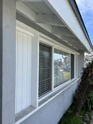 RESIDENTIAL BIRD CONTROL - This customer had previously installed spikes along the top ledge above this window. The spikes stopped the large birds but the smaller ones like sparrows and finches use the spikes as a better place to nest! So the spikes were removed and we came in cleaned off the ledge and customer cut and fit the bird slope to seal off the areas the birds were nesting. Now this part of the home will be bird free!