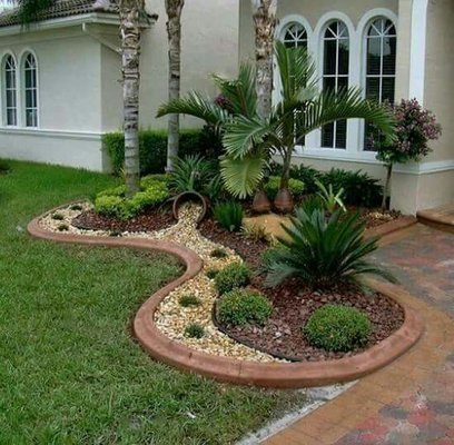 Stones, plants and trimming was done to a entryway - Add stones and trimming and plants to entryway Stones, plants and trimming was done to a entryway - Add stones and trimming and plants to entryway