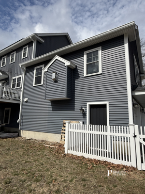 White Seamless Gutters in East Douglas - For this project in East Douglas, MA, we engineered and installed a complete custom white seamless gutter system.
The property features dark siding, allowing the crisp white gutters and downspouts to provide a sharp, clean contrast that frames the exterior beautifully. Technical execution focused on precise downspout routing alongside the existing structural trim, ensuring maximum water capacity and foundation protection without disrupting the architectural lines.
Every component was custom-measured and extruded on-site to guarantee a flawless fit, engineered specifically to withstand severe New England weather and prevent ice dam formations.
Precision exterior defense by High End Gutters Inc. White Seamless Gutters in East Douglas - For this project in East Douglas, MA, we engineered and installed a complete custom white seamless gutter system.
The property features dark siding, allowing the crisp white gutters and downspouts to provide a sharp, clean contrast that frames the exterior beautifully. Technical execution focused on precise downspout routing alongside the existing structural trim, ensuring maximum water capacity and foundation protection without disrupting the architectural lines.
Every component was custom-measured and extruded on-site to guarantee a flawless fit, engineered specifically to withstand severe New England weather and prevent ice dam formations.
Precision exterior defense by High End Gutters Inc.