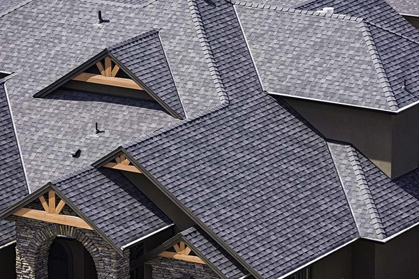 Architectural Shingles - Asphalt roofs are a popular and cost-effective roofing option, featuring shingles made from a combination of fiberglass and asphalt, which provide durability and resistance to various weather conditions. They come in a wide range of colors and styles, offering both versatility and a visually appealing finish for residential properties. Architectural Shingles - Asphalt roofs are a popular and cost-effective roofing option, featuring shingles made from a combination of fiberglass and asphalt, which provide durability and resistance to various weather conditions. They come in a wide range of colors and styles, offering both versatility and a visually appealing finish for residential properties.