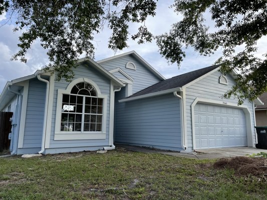 Exterior repaint on home with new siding - This customer had to replace their siding on the front of the home. A good reason to paint the entire home.
