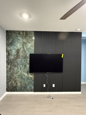 Panel installation - We installed premium decorative wall panels to give the space a clean, modern, and elegant look. Every panel was carefully measured and installed with precision to ensure a seamless finish. The result is a durable, low-maintenance accent wall that enhances the room’s style while adding lasting value to the home.