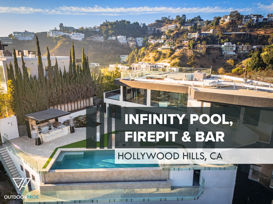 Infinity Pool, Fire Pit Lounge & Outdoor Bar in Hollywood Hills, CA - This Hollywood Hills project showcases a complete outdoor transformation featuring an infinity-edge pool, spa, sunken fire pit lounge, and custom bar area with breathtaking city views. Modern pavers, turf inlays, a water feature, and glass railings create a sleek, resort-style space designed for both relaxation and entertainment. Contact us today for a free consultation and let us bring your dream backyard to life! Infinity Pool, Fire Pit Lounge & Outdoor Bar in Hollywood Hills, CA - This Hollywood Hills project showcases a complete outdoor transformation featuring an infinity-edge pool, spa, sunken fire pit lounge, and custom bar area with breathtaking city views. Modern pavers, turf inlays, a water feature, and glass railings create a sleek, resort-style space designed for both relaxation and entertainment. Contact us today for a free consultation and let us bring your dream backyard to life!