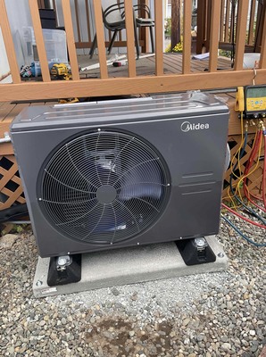 New Heat Pump and Furnace - When a Seattle homeowner switched on their air conditioning for the first time this summer, they expected the familiar rush of cool air that makes a Pacific Northwest heat wave manageable. What they got instead was warm air blowing through every vent in the house — and a sinking feeling that something was seriously wrong. Having not used the system since the previous cooling season, they weren't entirely sure when the problem had started. What they did know was that with summer temperatures climbing outside, a non-functioning air conditioning system was not something they could afford to ignore.

That's when they called Eco Electric, Plumbing, Heating, and Air — a trusted heating and cooling service provider serving Seattle and the greater Pacific Northwest.

Our licensed HVAC technicians arrived and conducted a thorough diagnostic evaluation of the existing system. What they found told the full story. The home's electric furnace and air conditioning unit were both original to the property — over 30 years old and well beyond the end of any reasonable service lifespan. Decades of continuous seasonal use had taken a significant cumulative toll on the system's core components. Refrigerant levels had dropped well below operating specifications, the aging compressor was struggling to function under the demands of active cooling, and the overall mechanical condition of the unit reflected the reality of a system that had simply reached the end of the road. At 30 plus years old, repairing individual components would have been a short-term fix at best, with the near certainty of additional failures to follow as the rest of the aging system continued its decline.

Our HVAC team presented the homeowner with a clear, honest assessment: a full system replacement was the most responsible and cost-effective path forward. After evaluating the home's cooling load requirements, our technicians recommended and installed a brand new Midea system — a modern, high-efficiency heating and cooling solution purpose-built for the demands of today's residential climate control needs. Midea systems are engineered for superior energy efficiency, quiet operation, and long-term reliability, delivering consistent, properly cooled air to every corner of the home while consuming significantly less energy than the decades-old unit it replaced.

The installation was completed with precision from start to finish. All existing connections were carefully evaluated, updated where necessary, and brought to current Washington state electrical and mechanical code standards. The new system was fully commissioned and performance tested before our team signed off, confirming that cool, conditioned air was flowing consistently to every room in the house exactly as it should be.

The difference was night and day. Where there had been warm, stagnant air and a system that had silently given up, there was now powerful, efficient cooling delivered by a brand new system built to handle Seattle summers for decades to come.

If you are a Seattle area homeowner dealing with an air conditioning system blowing warm air, an aging electric furnace or AC unit, or a system that has not been properly serviced in years, Eco Electric, Plumbing, Heating, and Air is ready to help. Our licensed HVAC technicians provide comprehensive diagnostics, system replacement, and new AC installation throughout Seattle, Bellevue, Kirkland, Redmond, Renton, and the surrounding King County communities.