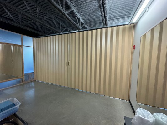 Accordion Doors - Learn how accordion doors serve as effective room dividers, benefiting spaces such as churches, Dance Studios, classrooms, and residential areas with their versatility.
