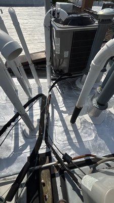 Roof Repair for Leaks Around Roof Penetrations - Noticing a leak around a roof penetration? Roof penetrations such as plumbing vents, HVAC equipment, and other rooftop components are common areas for water intrusion when flashing, seams, or sealants deteriorate.

At Anchor Point Roofing, we ensure roof penetrations are properly flashed and watertight around the base. For roof repair, we can install new modified bitumen around the base of the penetration and seal the repaired area with Lucas 6000 to help prevent water from getting underneath the roofing system.

If you’re dealing with a roof leak around a penetration in Chicago, Anchor Point Roofing can inspect the area and recommend the appropriate repair.