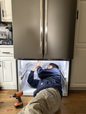 Ice Maker Repair - This service was done in a GE freezer to repair the broken icemaker. After this fix, we were able to get it back to working up to PAR! Ice Maker Repair - This service was done in a GE freezer to repair the broken icemaker. After this fix, we were able to get it back to working up to PAR!