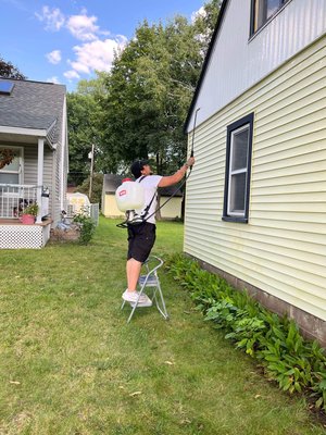 D & D pressure washing. Soft wash house and garage pressure wash driveway - There was some moss growing on this customer house and along with a lot of other organic growth. The customer called me and  he let me know what he wanted done I was able to give the customer estimate over the. so I was able to come out the next day to get it done!