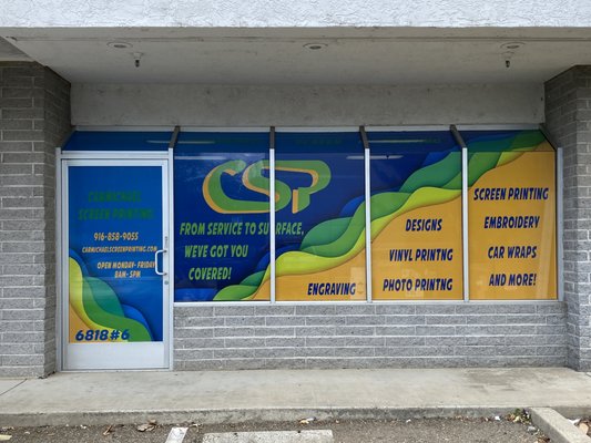 Window Graphics - We used our large vinyl printer to create a custom window graphic for our store front! Our vinyl printer can also print stickers, wall graphics, floor graphics, car wraps, and more!