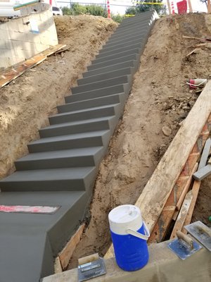 Concrete Stairway - This stairway concrete was completed in 2 days. Dirt was removed and forms were built to adjust stairway and also put rebar.
